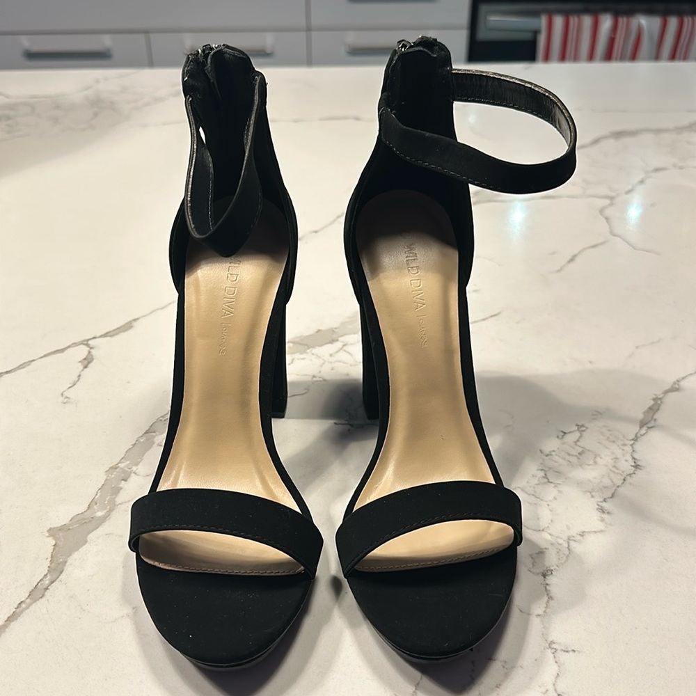 Black suede pumps